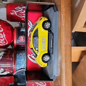 Collector Coca cola yellow matchbox beetle